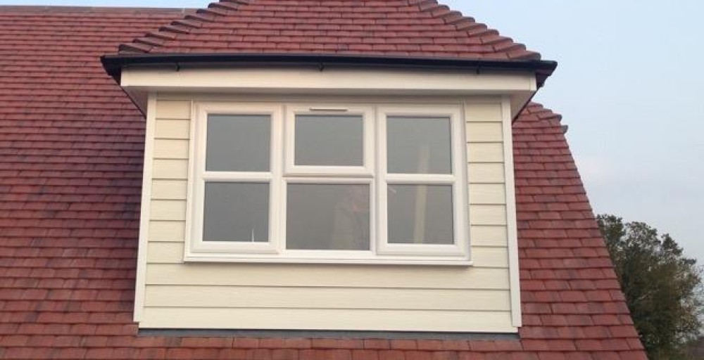 Double storey extension with a pitched roof dormer